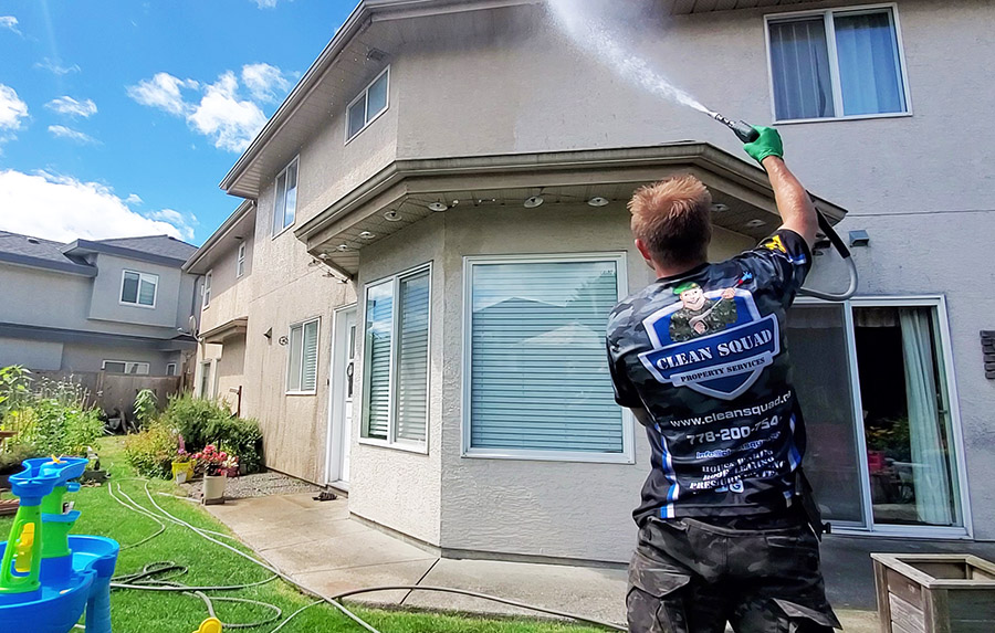 team member washing a home in richmond bc